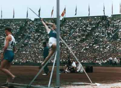 Again it's Kataja,
and once more he easily clears the bar. - XIVth Olympiad: The Glory of Sport