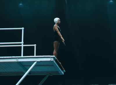 Again, Vicki Draves takes her place
on the high board, - XIVth Olympiad: The Glory of Sport