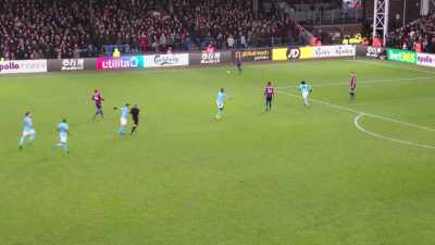 Agüero feeds Sané.
Sané's held back there by Kelly. - All or Nothing: Manchester City