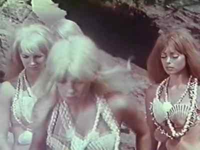 Ah, feels good to sit. - Voyage to the Planet of Prehistoric Women
