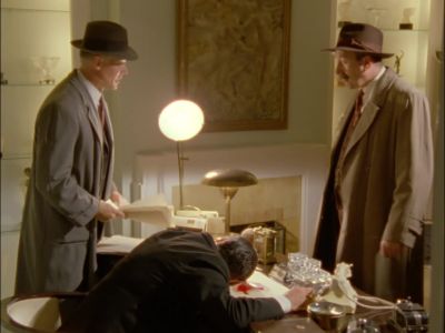 - Ah, that was under the desk. - Agatha Christie's Poirot