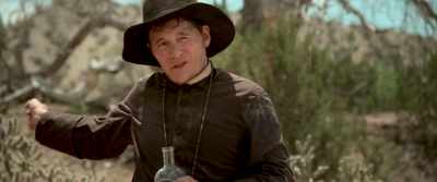 AH, WELL,
ME AND THIS MULE HERE, - In a Valley of Violence