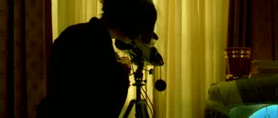 Ah, you've noticed my video cameraat the window. - Amélie