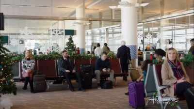 [airplane alert beeps] - Christmas Connection