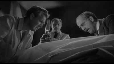 - Alan, look at this.
- What? - The Crawling Eye