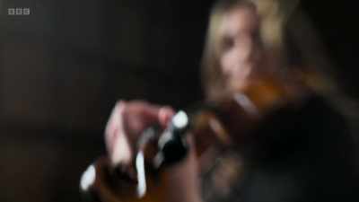 Alexia teaches violin to students - Secrets of Size: Atoms to Supergalaxies