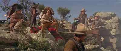 (ALL CHATTERING DRUNKENLY
IN SPANISH) - The War Wagon