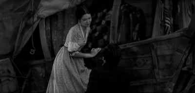 All it needs is a lovely
woman to preside there. - The Big Trail