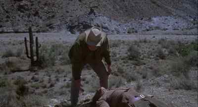 All right,
cover him with rocks - Chato's Land