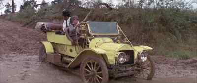All right, now, jam her under the axle. - The Reivers