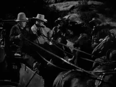 All right, throw down
those guns. Get 'em up. - The Oklahoma Kid