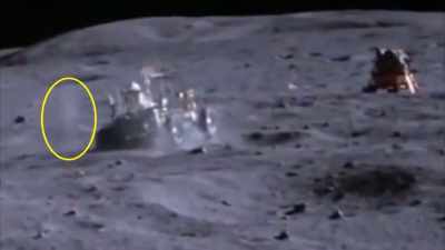 All sand particles, both
both heavy and light, - American Moon