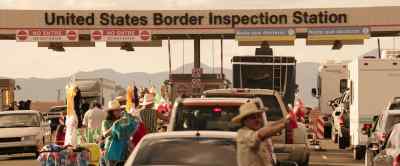 All vehicles, please proceed
slowly in assigned lanes... - We're the Millers