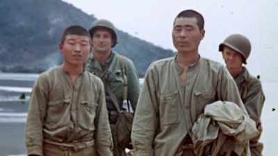 Almost to a man, they
had fought to the death. - The Pacific War in Color