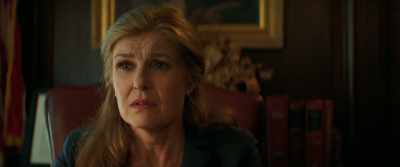 Amber is sitting in a diner, - Promising Young Woman