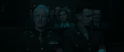 Amid the corpses are human skeletons too weak to move. - Nuremberg