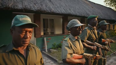 'Amos and his committed team
of rangers - A Year on Planet Earth