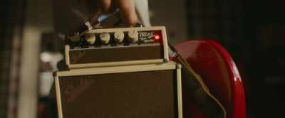 -[amplifier beeps]
-[rock music playing] - The Present