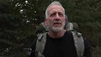 An adult black bear, - Expedition Bigfoot