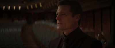 An assassin masquerading
as a security guard - Left Behind: Rise of the Antichrist