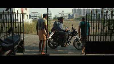 An auto rickshaw collided
with a cow and overturned. - Romancham