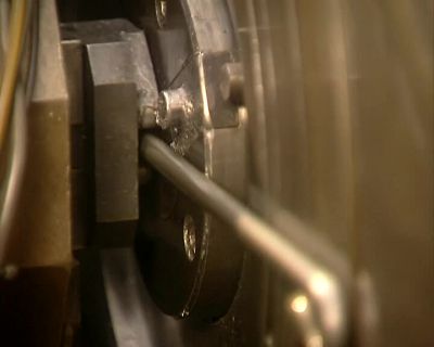 AN AUTOMATED MACHINE
BENDS A PIECE OF WIRE - How It's Made