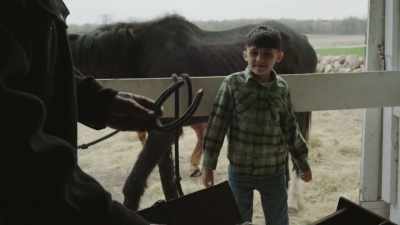 An old man giving a young boy
a horseshoe. - Joe Pera Talks With You