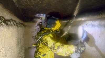 An underground grease trap
that's clogged - Sewer Divers