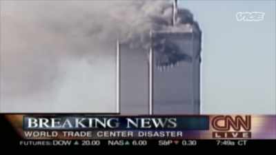 {\an8}-A plane has crashed into
one of the towers - While The Rest Of Us Die