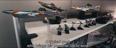 {\an8}A typical geek
who brings his personal life to work. - Shin Ultraman