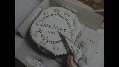 {\an8}[Bob Costas] It was Letterman's
third anniversary show, - Mr. McMahon