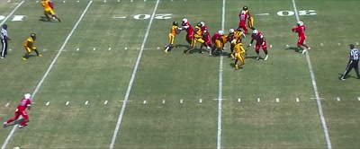 {\an8}[commentator] Shedeur Sanders looking
back to pass it, has time... - Coach Prime