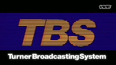 {\an8}-From Turner
Broadcasting System, - The Nine Lives of Vince McMahon