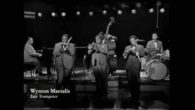 {\an8}He was bringing a gift,
the gift of a presentness - Louis Armstrong's Black & Blues