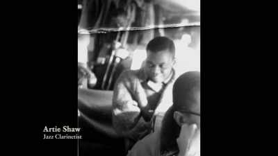 {\an8}He was playing in Los Angeles
one time. I don't remember where. - Louis Armstrong's Black & Blues