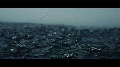 {\an8}- We're talking
about a big swell - 100 Foot Wave