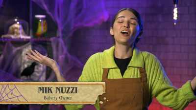 {\an8}I'm Mik Nuzzi, and you can
call me your "kitchen witch". - Halloween Cookie Challenge