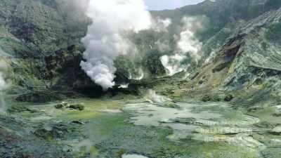 {\an8}[LIVELY MUSIC TURNS OMINOUS] - The Volcano: Rescue from Whakaari
