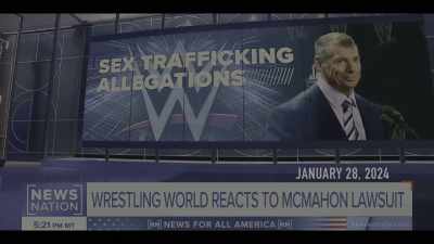 {\an8}[reporter] A WWE mogul resigning on Friday - Mr. McMahon