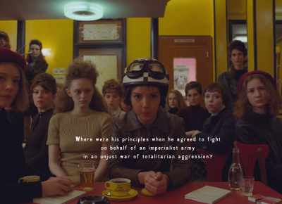 {\an8}(SPEAKING FRENCH) - The French Dispatch