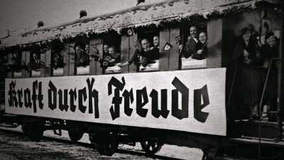 {\an8}STRENGTH THROUGH JOY - Hitler and the Nazis: Evil on Trial