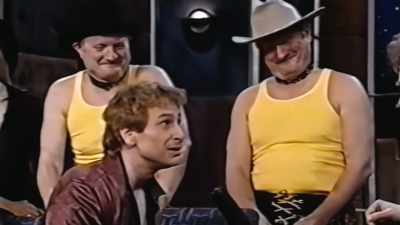 {\an8}There were three men
that were on television when I was young - Outstanding: A Comedy Revolution