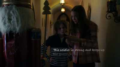 {\an8}"This soldier is strong
and keeps up his guard, - Mystery on Mistletoe Lane