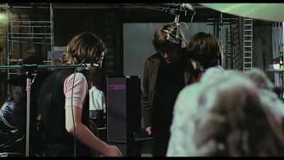 {\an8}- We aim to please.
- I rang Chris and-- - The Beatles: Get Back