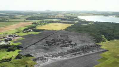 And behind the lines,
the photograph shows a network - Scotland from the Sky