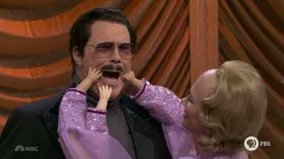‫And by wonderful, I mean
‫visually offending.
‫And thanks once again to three - SNL50: The Anniversary Special