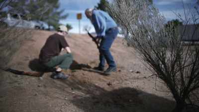 And they came across
this dirt berm - Buried In The Backyard