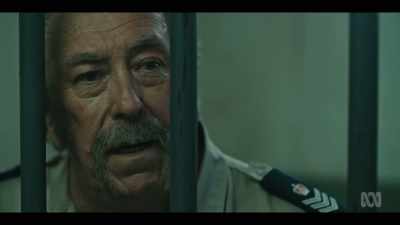 "And he doesn't care who
he hurts to find out." - Mystery Road: Origin
