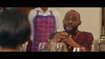 And during your service, you'll
spot Tunde in the congregation, - King of Boys: The Return of the King