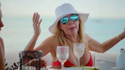 - And to get her a drink,
and now you're - The Real Housewives Ultimate Girls Trip